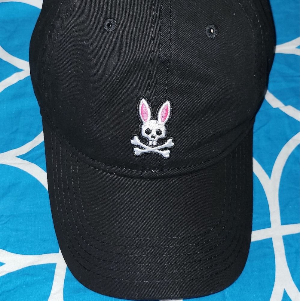Adjustable strap cap